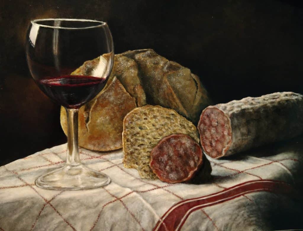 Aspertif painting by Vivian Mosley featuring a glass of wine, salami, and bread on a table