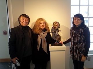 Peggy Sibila with two friends at gallery