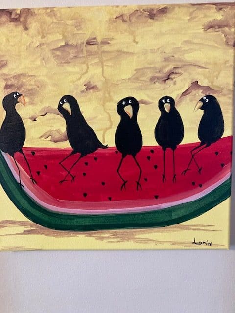 Five crows sitting on a watermelon